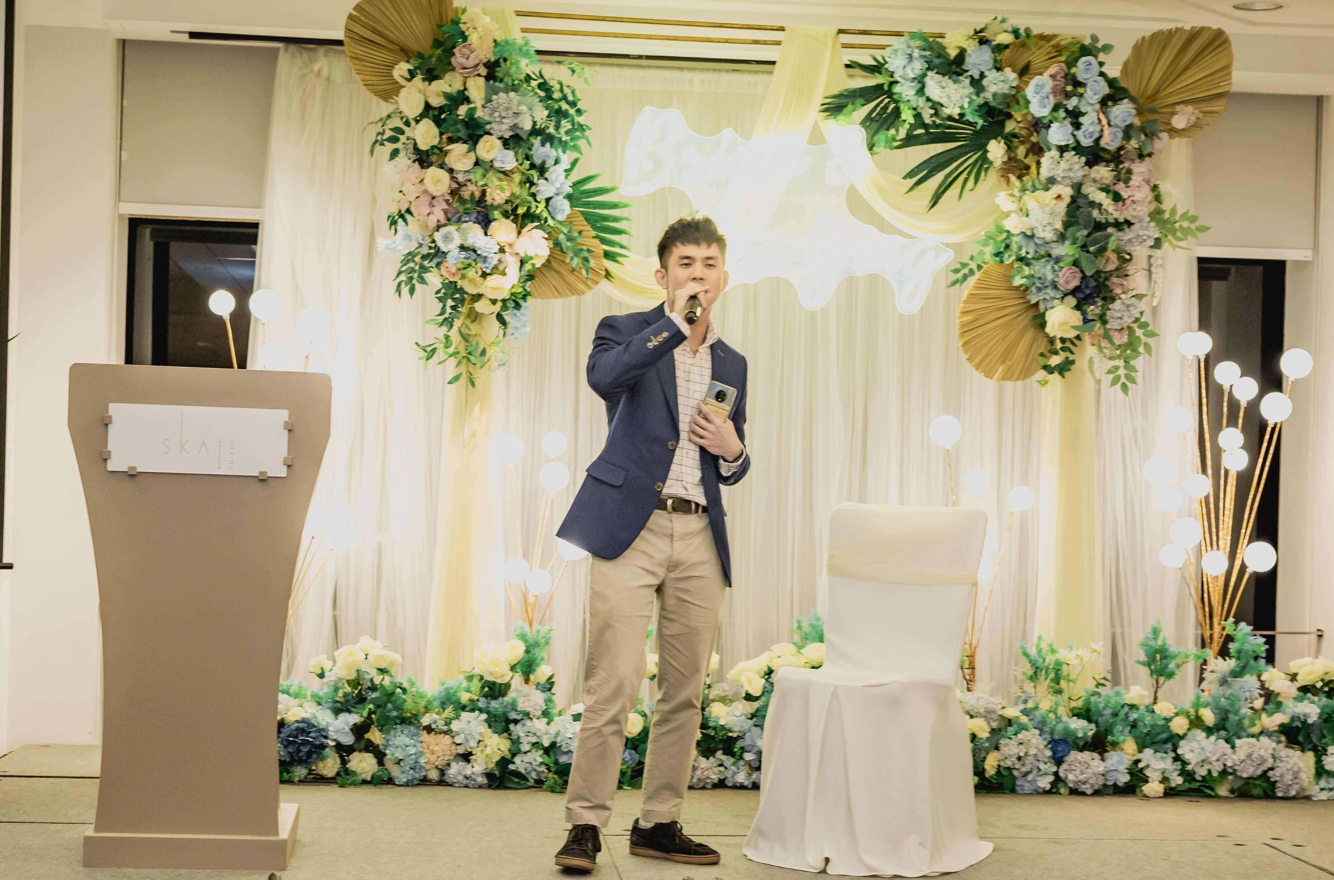 Emcee Bean hosting a corporate event in Singapore