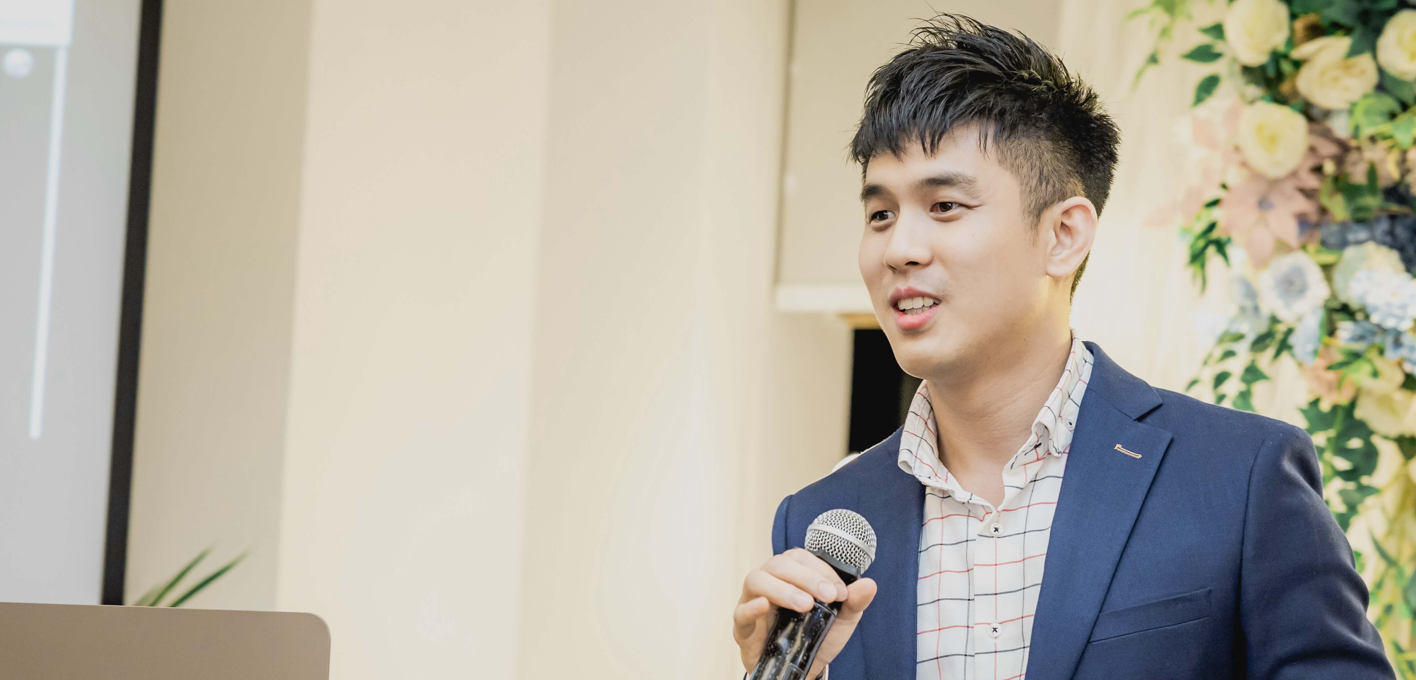 Emcee Bean performing at a corporate event in Singapore